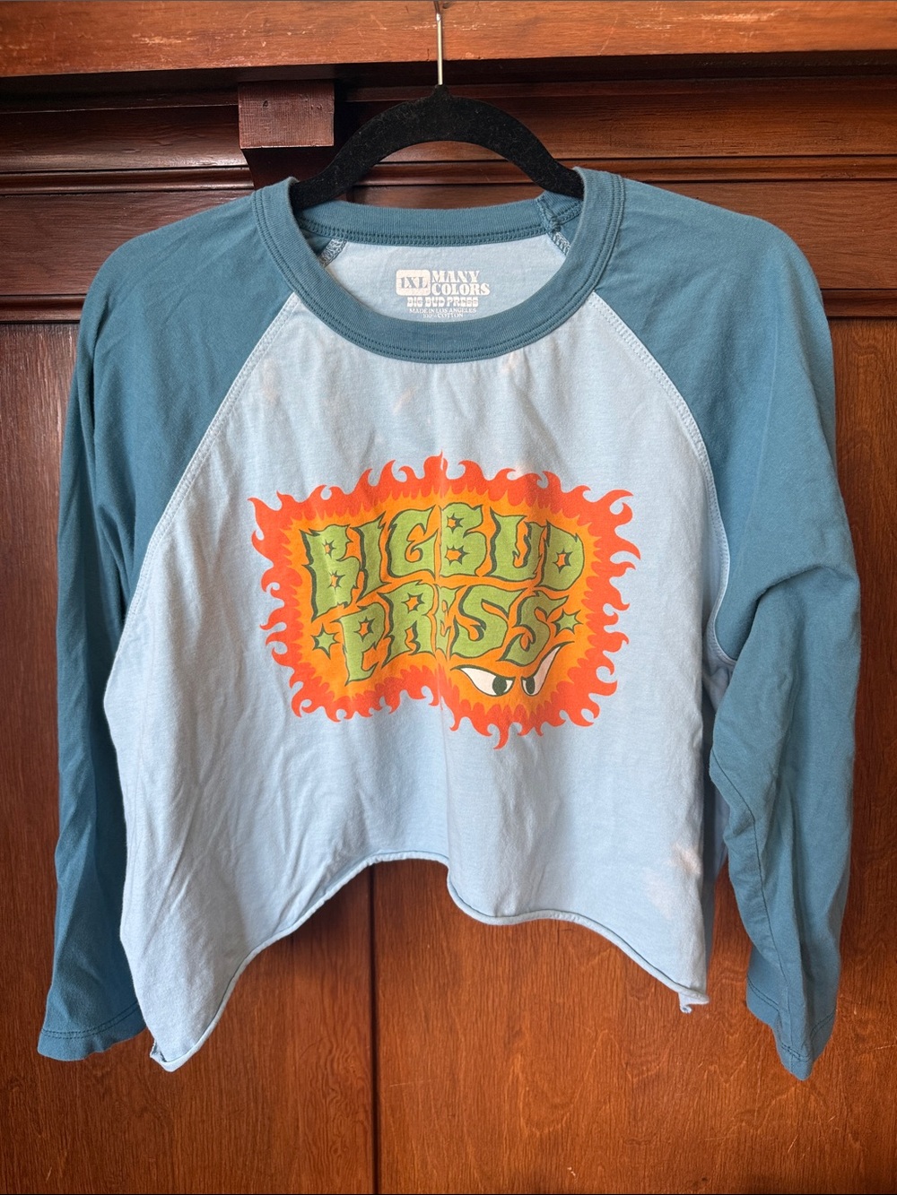 Big Bud Press Light Blue & Teal Cropped Raglan Top with Orange Graphic